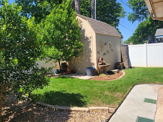 6704 Tall Oaks Dr, Oklahoma City, OK 73127 - view of yard featuring a storage shed and an outdoor structure