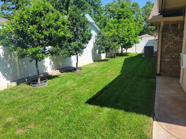 6704 Tall Oaks Dr, Oklahoma City, OK 73127 - view of yard featuring central air condition unit