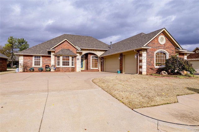 ranch-style home featuring a garage