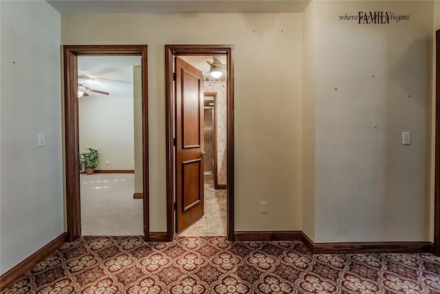 corridor featuring light tile patterned floors