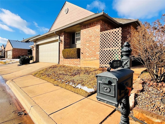 view of front of home with a garage