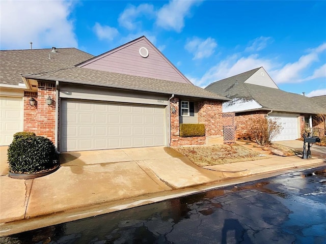 ranch-style home featuring a garage