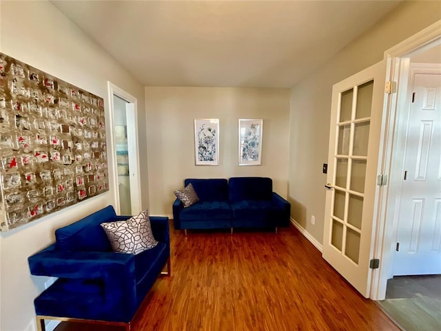 living area with dark wood-type flooring