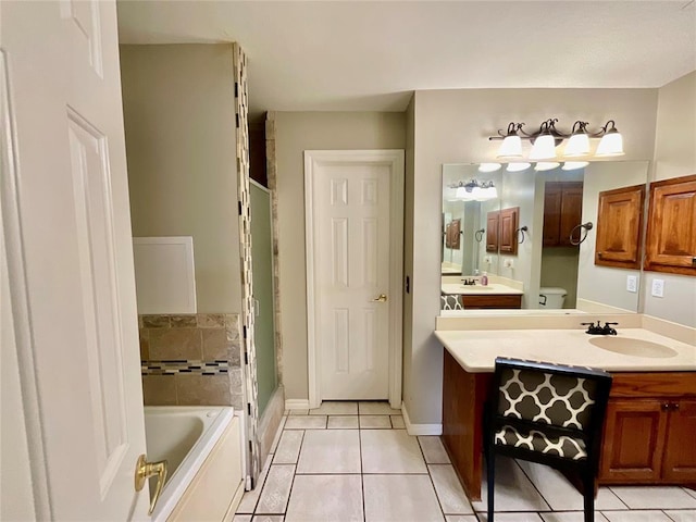 full bathroom with tile patterned flooring, vanity, independent shower and bath, and toilet