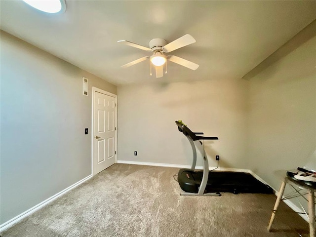 exercise area with carpet and ceiling fan