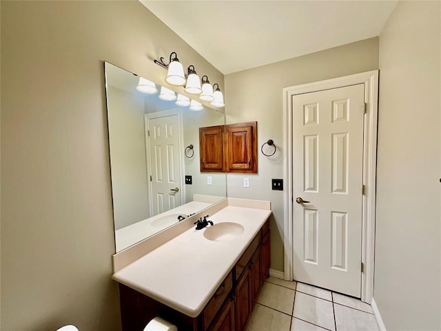 bathroom with vanity and tile patterned floors