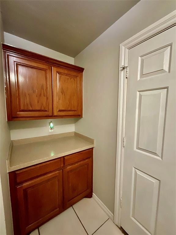 kitchen with light tile patterned floors