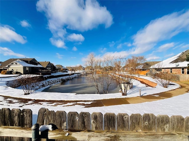 view of snow covered pool