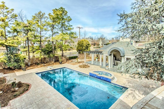 view of swimming pool featuring a patio area, an in ground hot tub, and a pergola