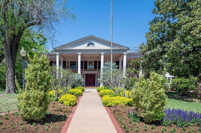 view of greek revival inspired property