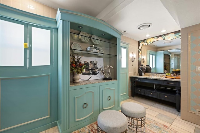 bathroom featuring tile patterned floors and vanity