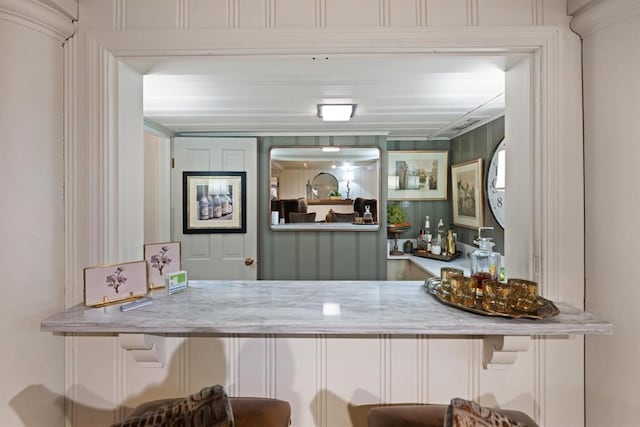 kitchen featuring light stone counters