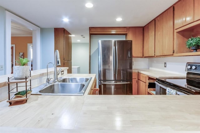 kitchen with appliances with stainless steel finishes and sink