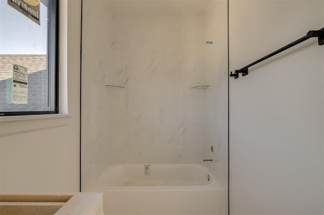 bathroom with shower / bathing tub combination