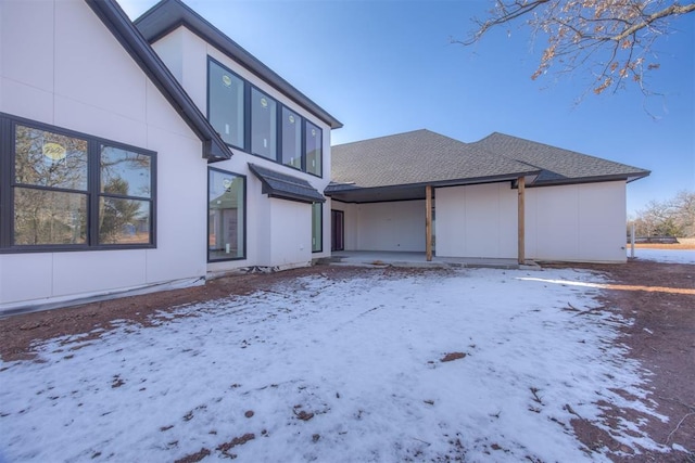 view of snow covered property