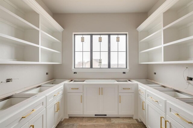 kitchen with white cabinetry