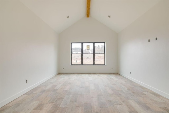 unfurnished room with light hardwood / wood-style flooring, high vaulted ceiling, and beam ceiling