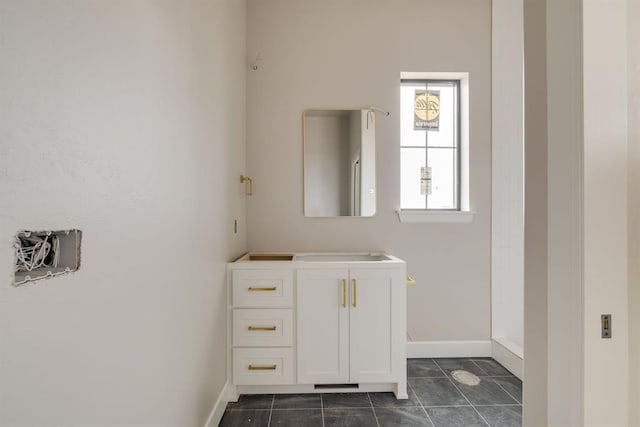 bathroom featuring vanity and tile patterned flooring