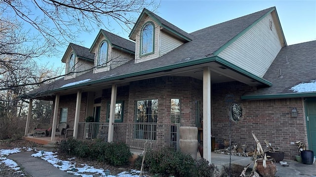 view of front of property featuring covered porch