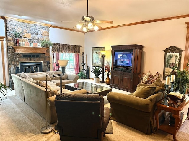 living room with crown molding, ceiling fan, light carpet, and a stone fireplace