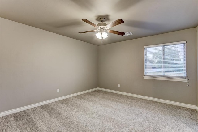 unfurnished room with ceiling fan and carpet floors