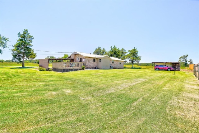 view of yard with a deck