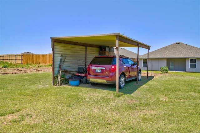 exterior space featuring a yard and a carport