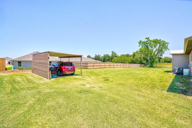 view of yard with a carport