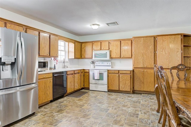 kitchen with stainless steel appliances and sink