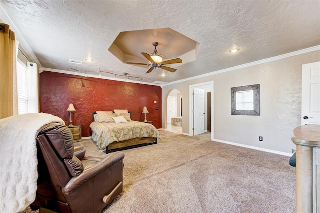 carpeted bedroom featuring a raised ceiling, crown molding, and a textured ceiling