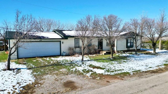 ranch-style house with a garage