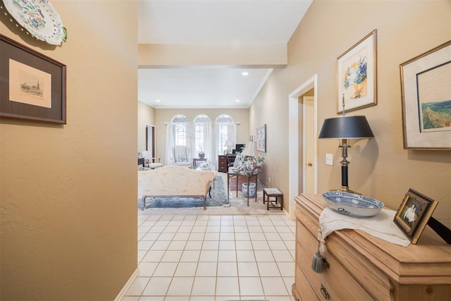 bedroom with light tile patterned floors