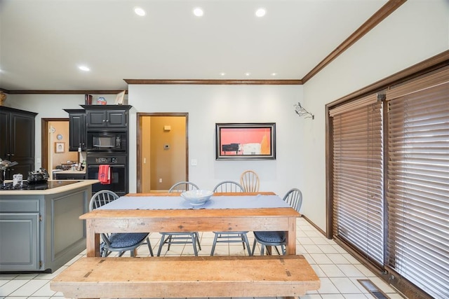 tiled dining room with ornamental molding