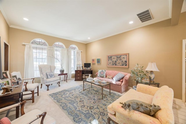 living room with ornamental molding and light carpet