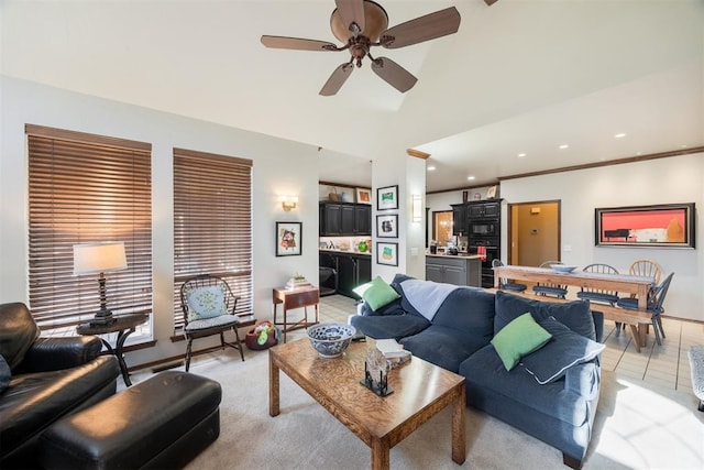 living room featuring ceiling fan and light tile patterned flooring