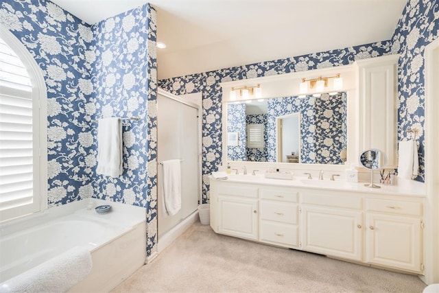 bathroom with a tub and vanity