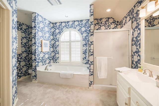 bathroom with a bath and vanity