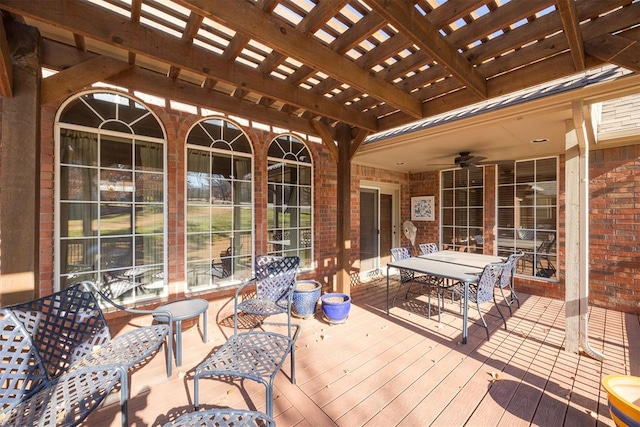 deck featuring a pergola and ceiling fan