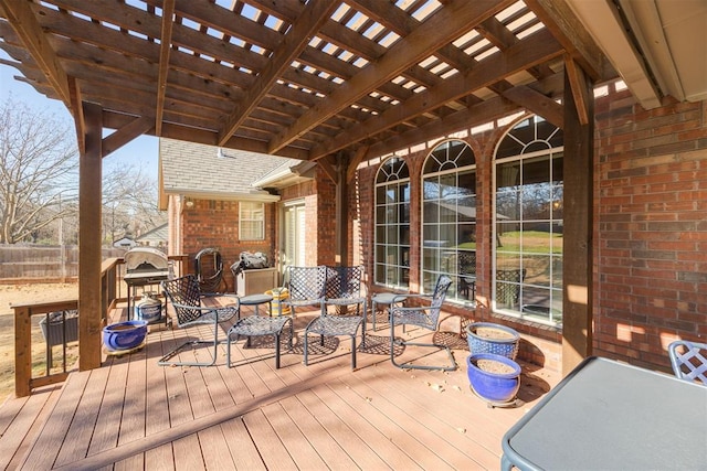 wooden deck with a pergola