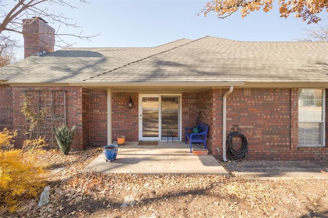 back of property featuring a patio