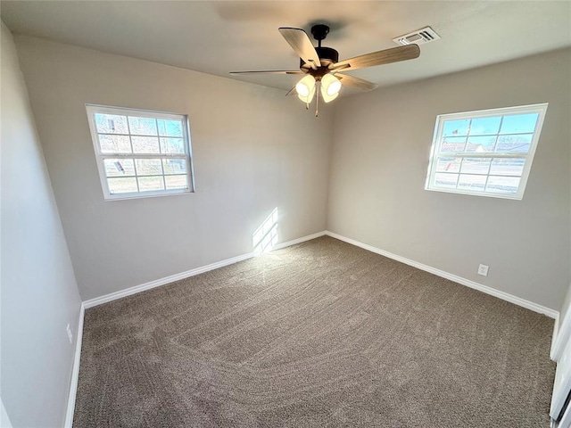 carpeted empty room with ceiling fan