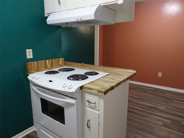 kitchen featuring dark wood-type flooring, white electric stove, and white cabinets