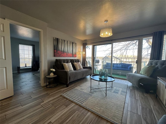 living room featuring a chandelier