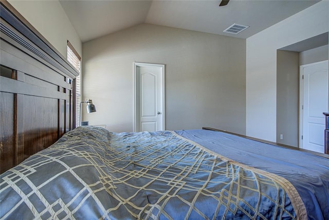 bedroom featuring ceiling fan and vaulted ceiling