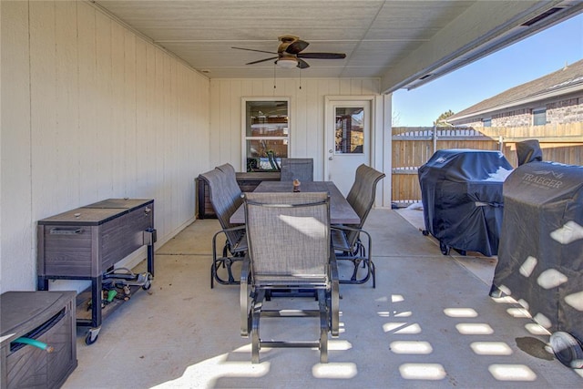 view of patio with ceiling fan and a grill