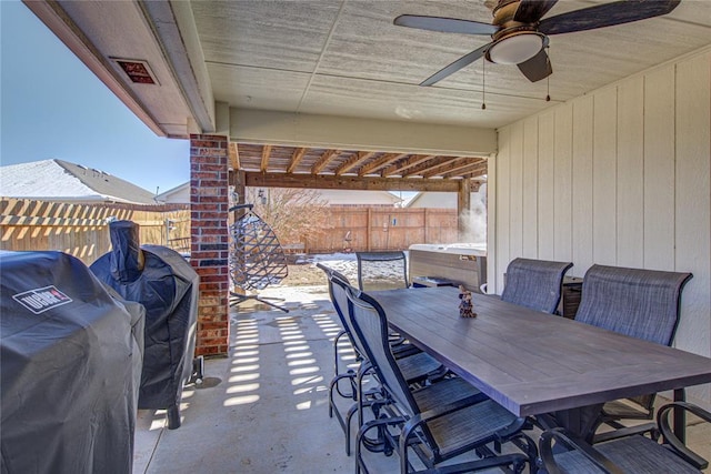 view of patio / terrace with grilling area and ceiling fan