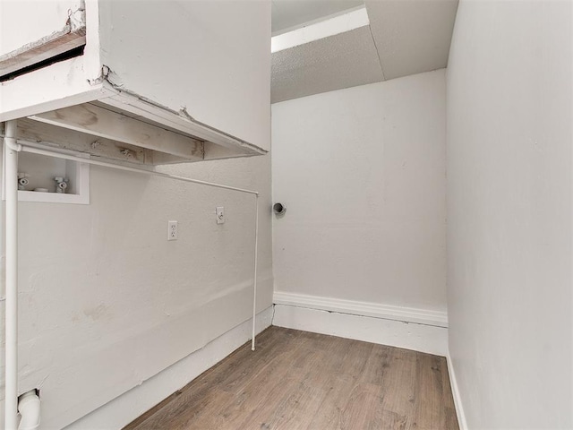 washroom with hardwood / wood-style flooring