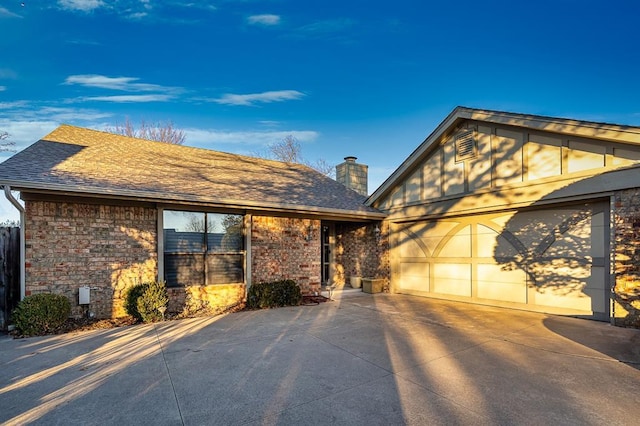 view of front of property with a garage