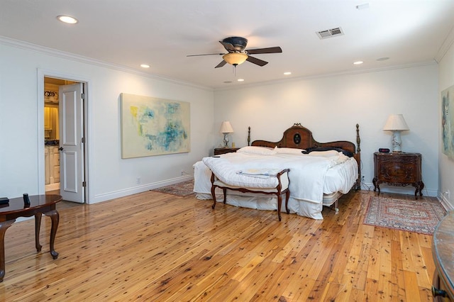 bedroom featuring ceiling fan, light hardwood / wood-style floors, and crown molding