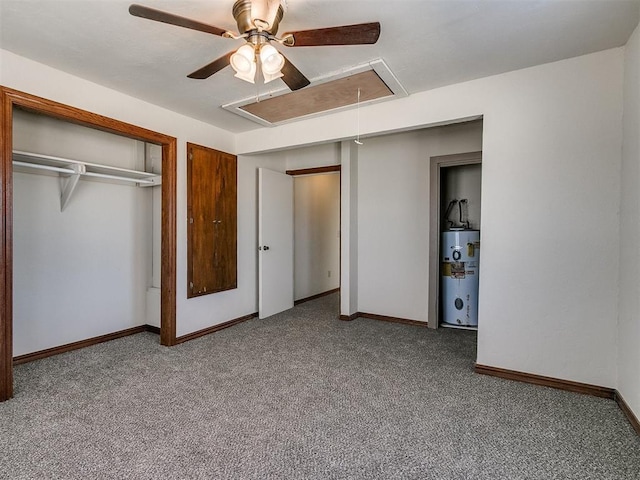 unfurnished bedroom featuring ceiling fan, gas water heater, and carpet flooring